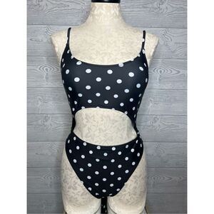 Black with white polkadot one piece, bathing suit size medium